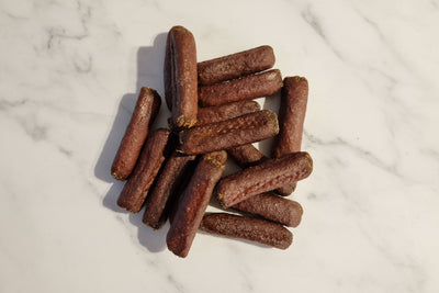 dog treats on a white marble backgorund