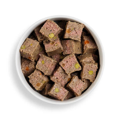 Close-up of Forthglade turkey wet dog food in a bowl, highlighting the natural texture and grain-free ingredients.