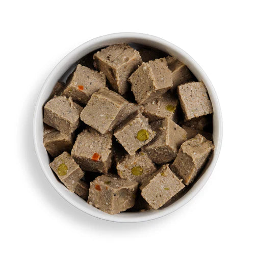 Close-up of Forthglade Salmon Wet Dog Food showing soft flakes of gently steamed salmon and vegetables in a wholesome, grain-free recipe