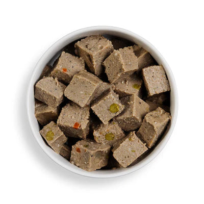 Close-up of Forthglade Salmon Wet Dog Food showing soft flakes of gently steamed salmon and vegetables in a wholesome, grain-free recipe