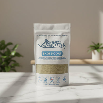 Shanzi Naturals Skin & Coat product packaging on a wooden surface with a gray background