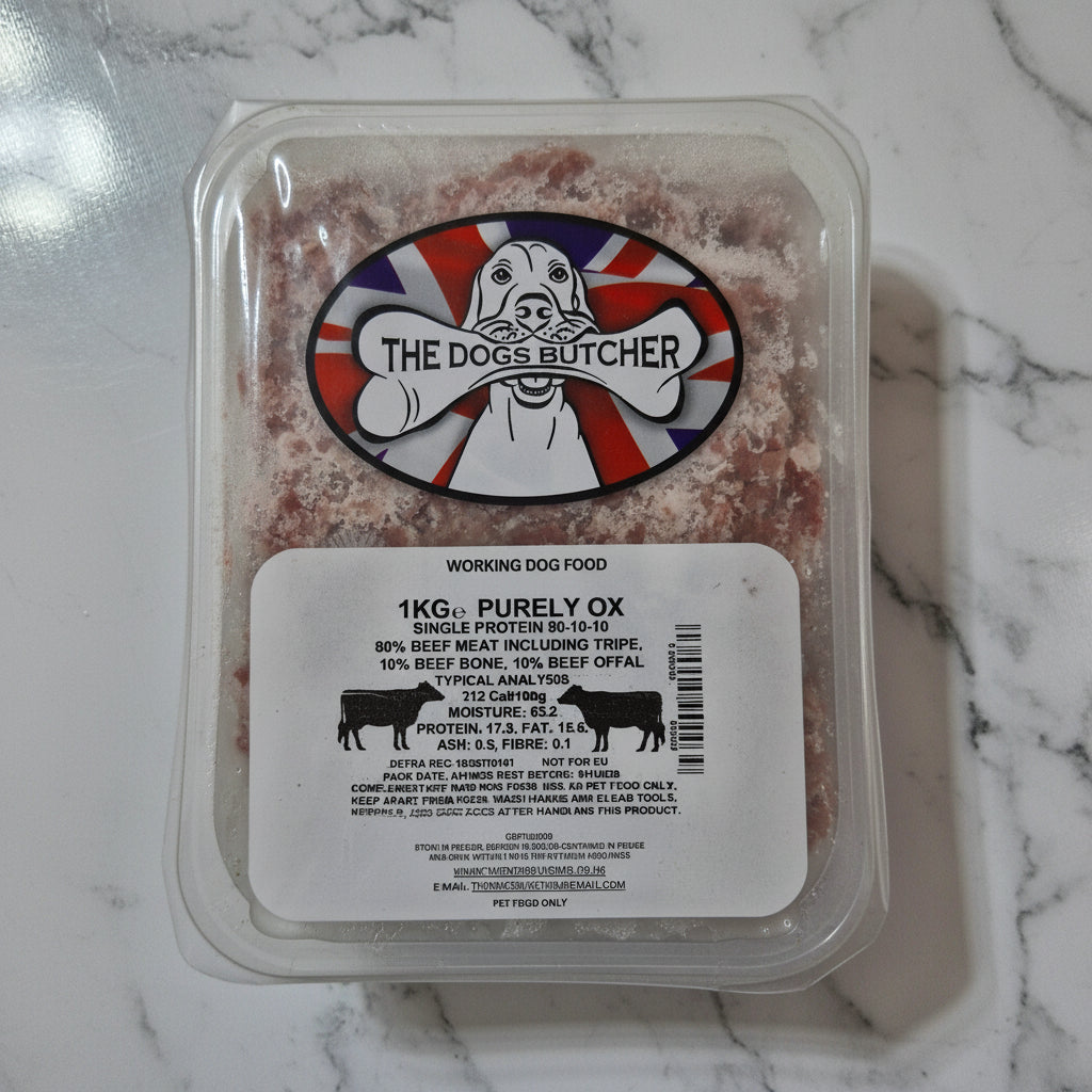 Packaged dog food with 'The Dog's Butcher' label on a white background
