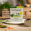 Forthglade Lamb Complete dog food pack placed in a scenic kitchen setting, emphasizing its natural, wholesome qualities.
