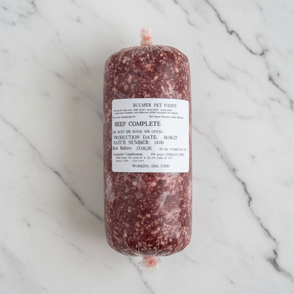 Raw beef product with a label on a wooden surface