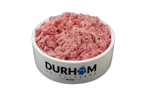 A bowl of DURHAM brand quail mince feed, predominantly pink in color, with the brand name visible on the bowl.