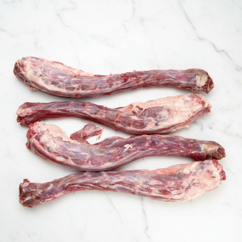 Raw meat bones on a white background