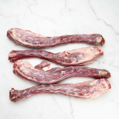 Raw meat bones on a white background