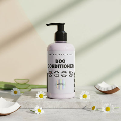Shanzi Naturals dog conditioner bottle on a wooden surface with striped background
