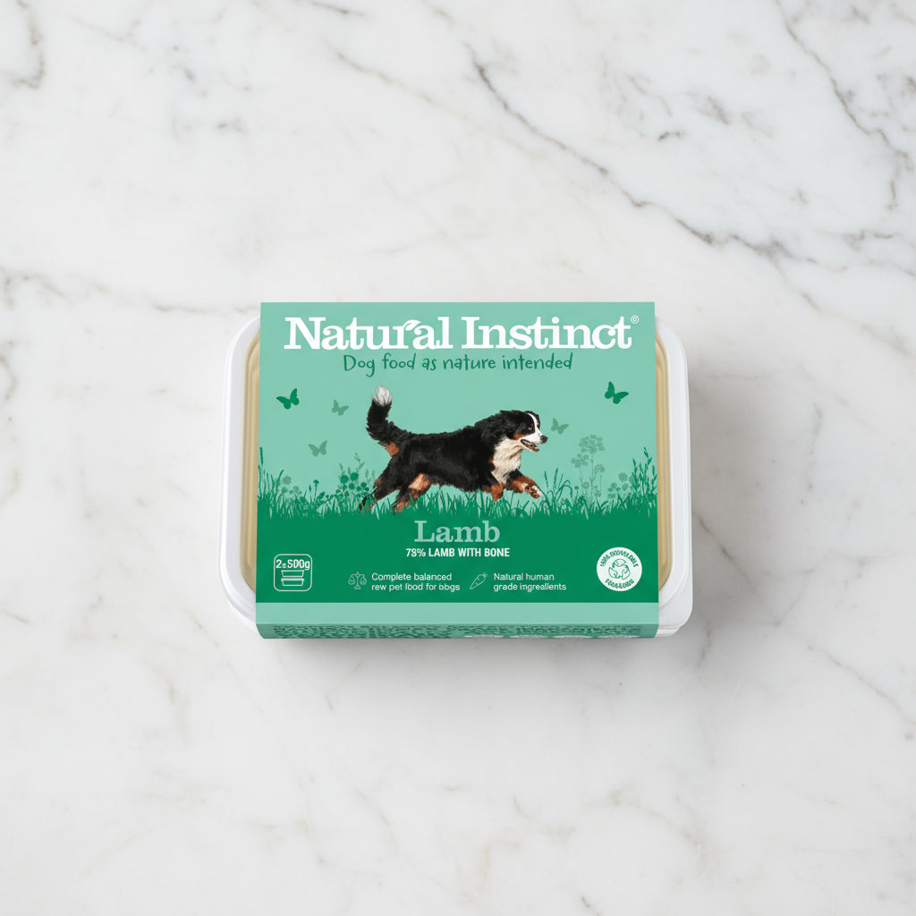 Dog food packaging with 'Natural Instinct' branding and a dog illustration on a green background.