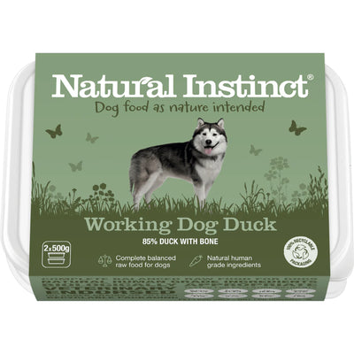Dog food packaging with 'Natural Instinct' branding and a husky illustration on a green background.