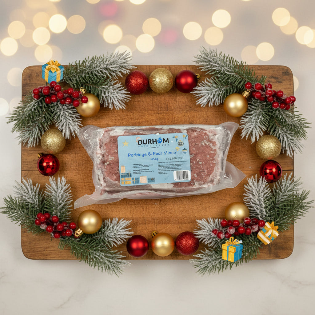 Packaged partridge and pear mince with Durham label on a shelf.