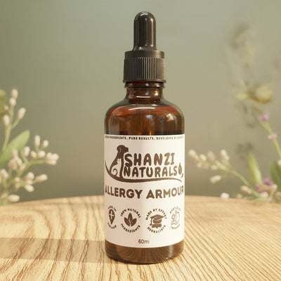 Bottle of Shanzi Naturals Allergy Armoise on a light wooden surface
