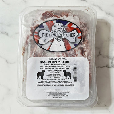 Packaged dog food with 'The Dog's Butcher' label on a white surface